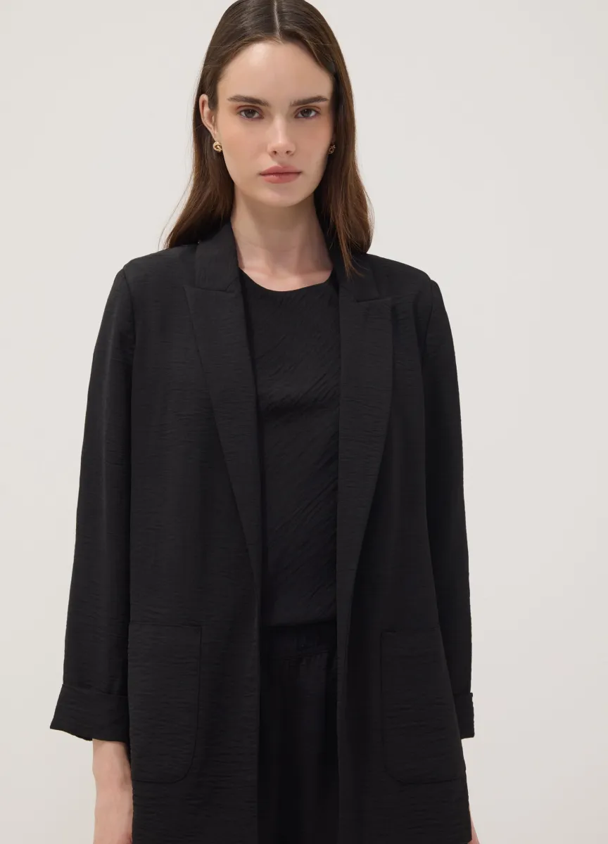 Blazer nero regular fit con rever classico