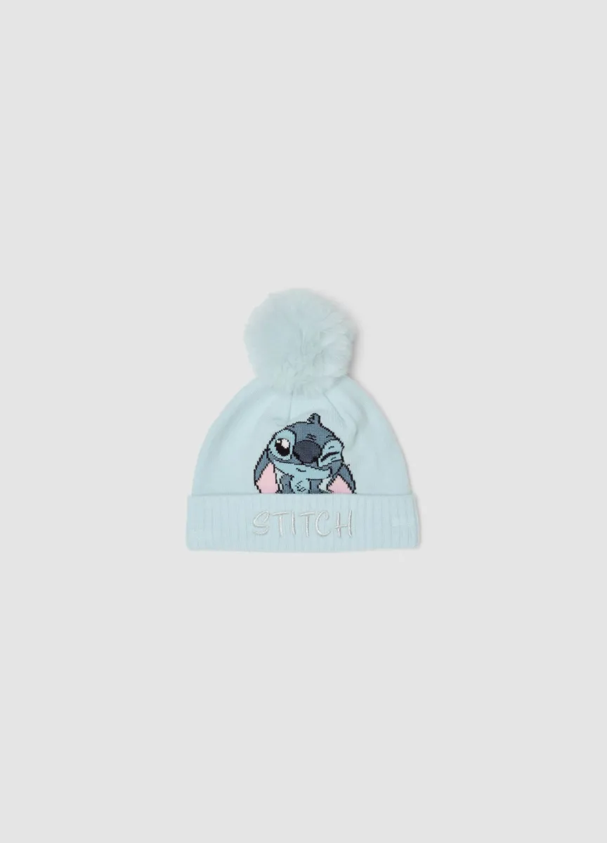 Cappello azzurro in viscosa elasticizzata con pon pon e stampa Lilo & Stitch