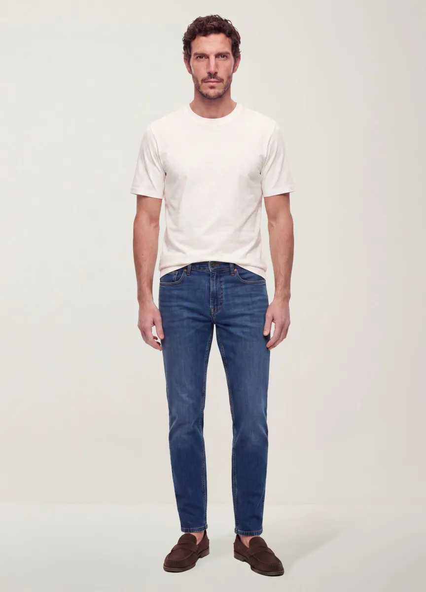 Jeans blu slim tapered fit in cotone elasticizzato