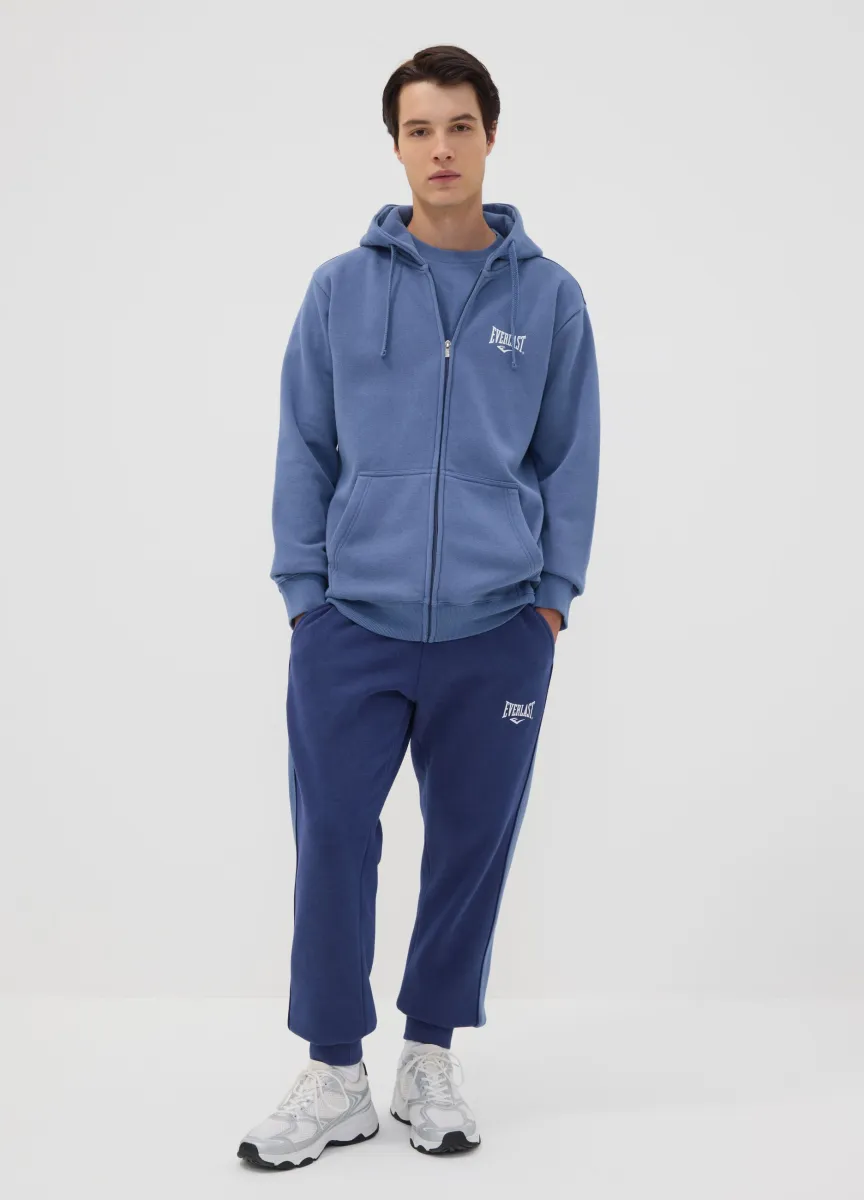 Pantaloni sportivi blu in misto cotone con stampa