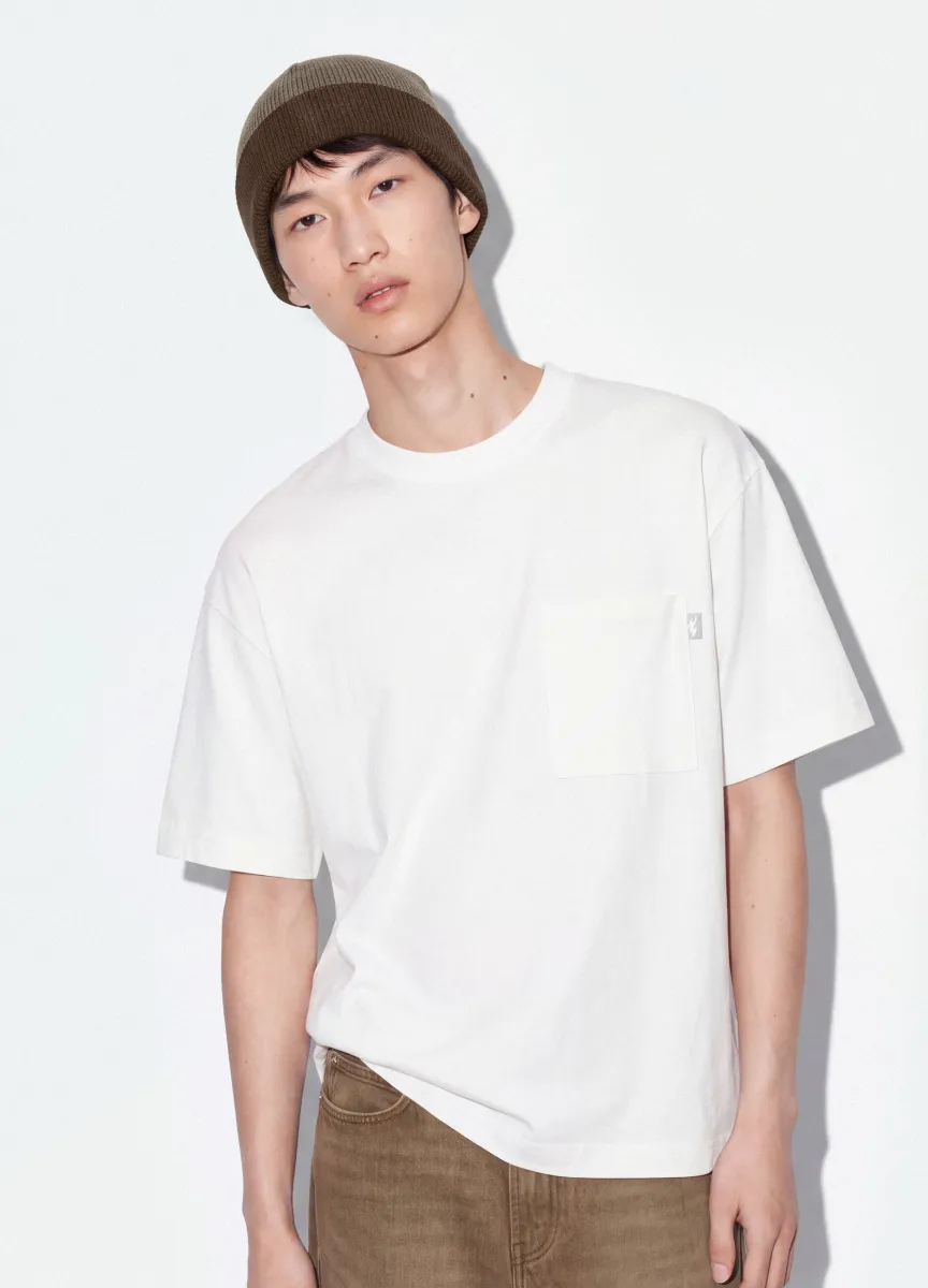 T-shirt bianca in puro cotone girocollo con taschino boxy fit