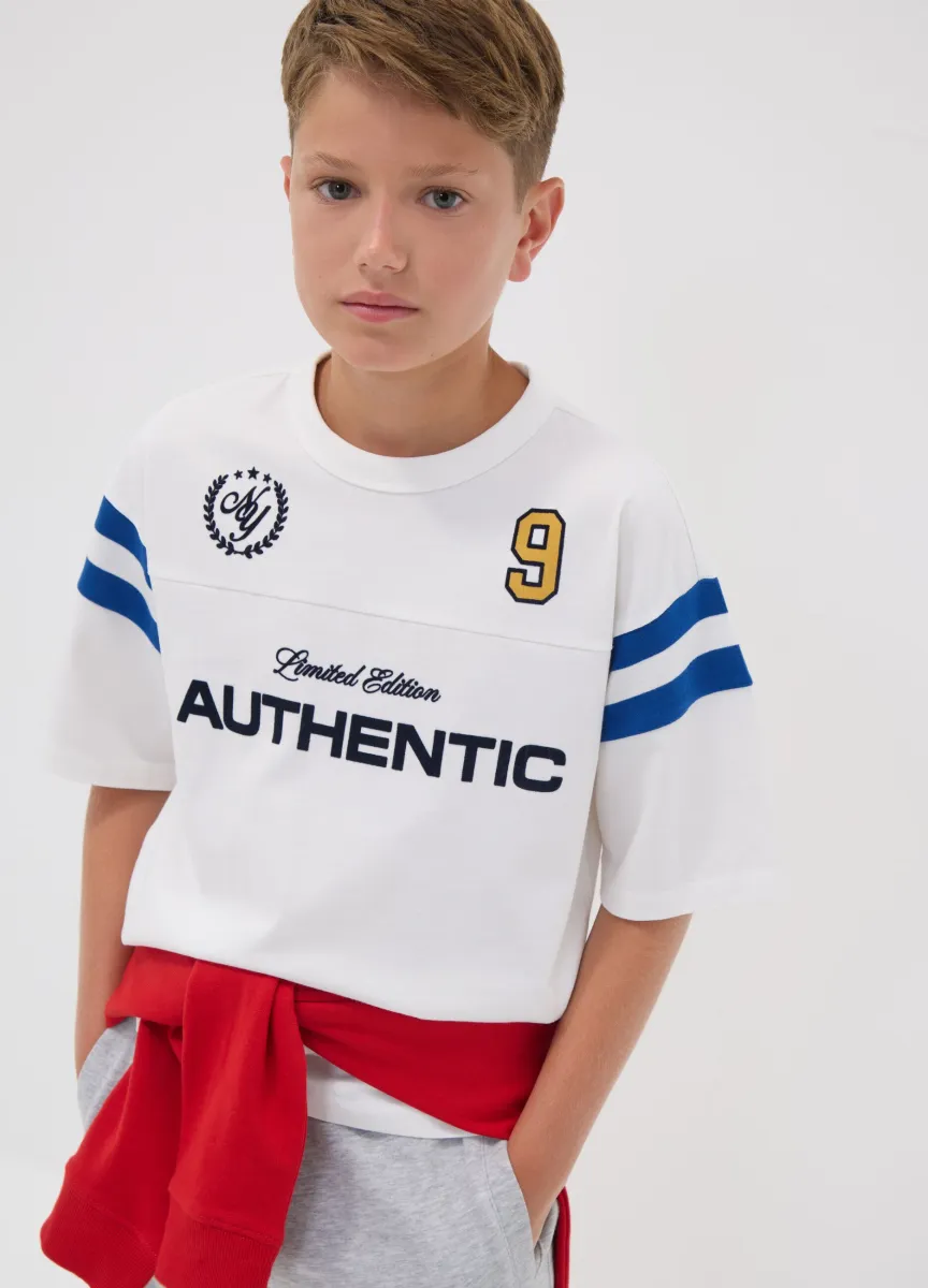 T-shirt relaxed fit bianca in puro cotone girocollo con scritta per ragazzo