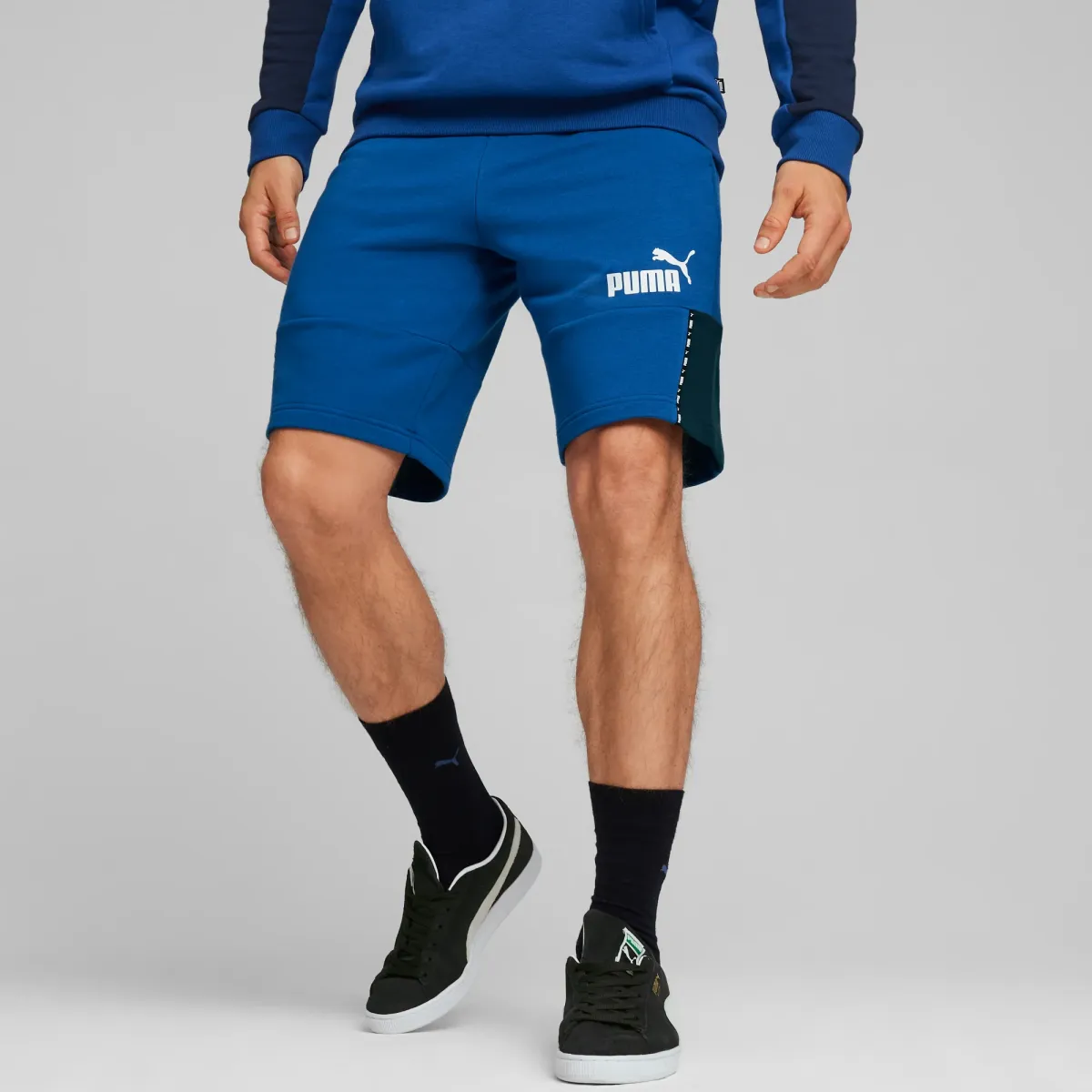 Pantaloncini sportivi blu da uomo Puma Block x Tape
