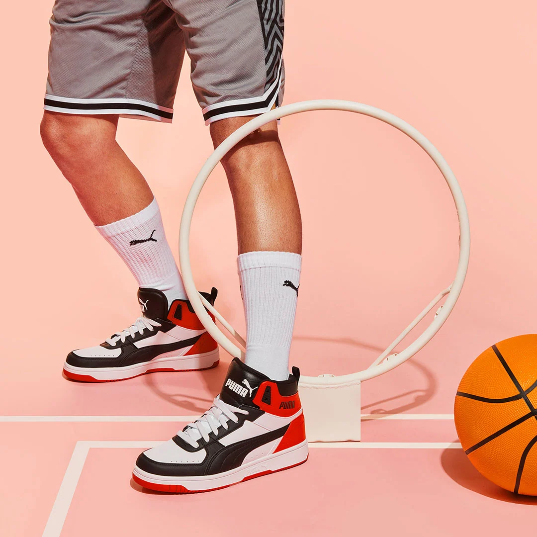 Sneakers alte bianche, rosse e nere con logo a contrasto Puma Rebound Joy